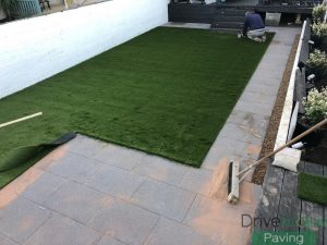 Black Granite Slab Patio with Artificial Lawn in Dublin
