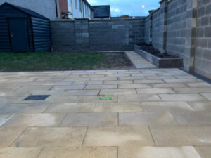 Buff Granite Slabbed Patio with Raised Flower-Beds in Hansfield Wood, Dublin