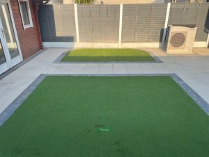 Newgrange Granite Buff Patio with Slane Borderline and Artificial Grass in Hansfield Wood, Dublin