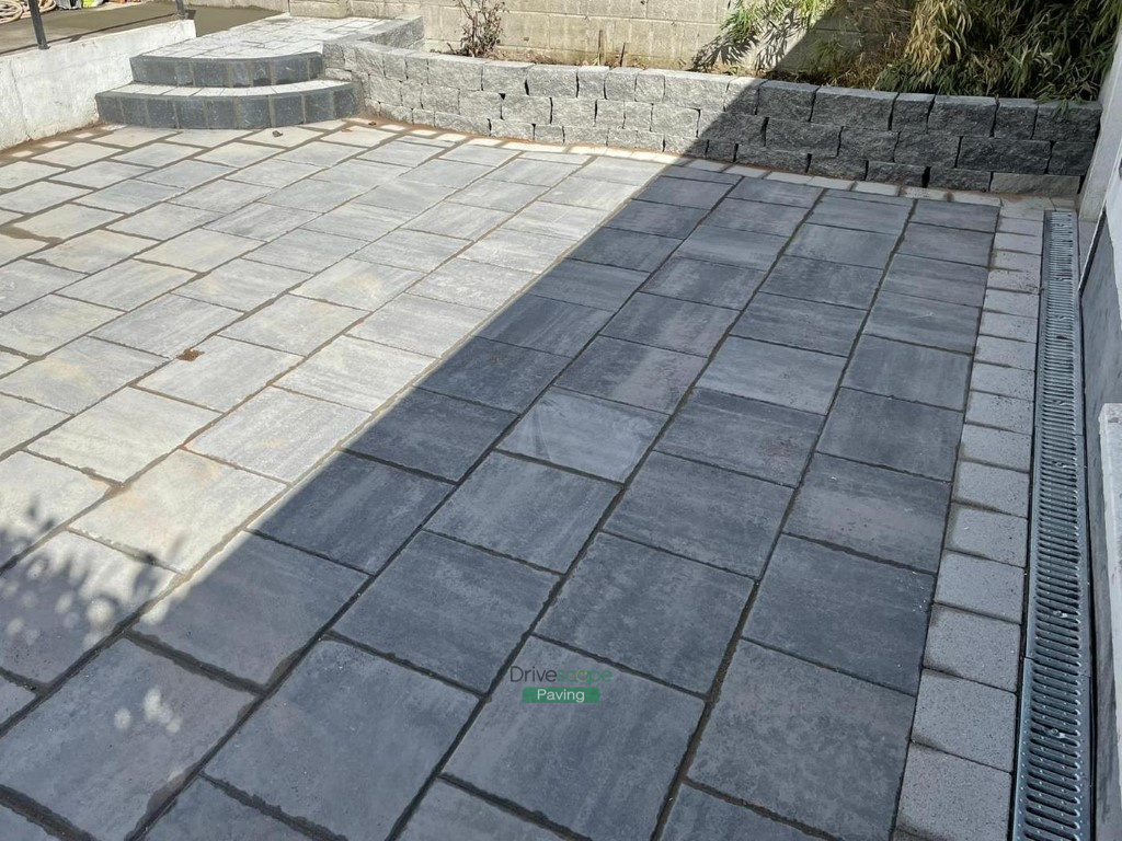 Patio with Silver Grey Granite Slabs and Connemara Walling in Donaghmede, Dublin