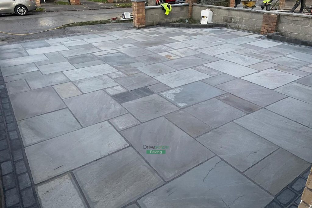 Driveway with Kandla Grey Limestone Slabs and Cobblestone Border in Hartstown, Dublin