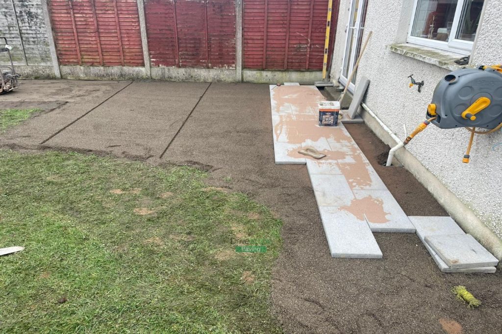 Patio with Newgrange Granite Slabs and Charcoal Border, New Steps and Roll-on Turf in Dublin (2)