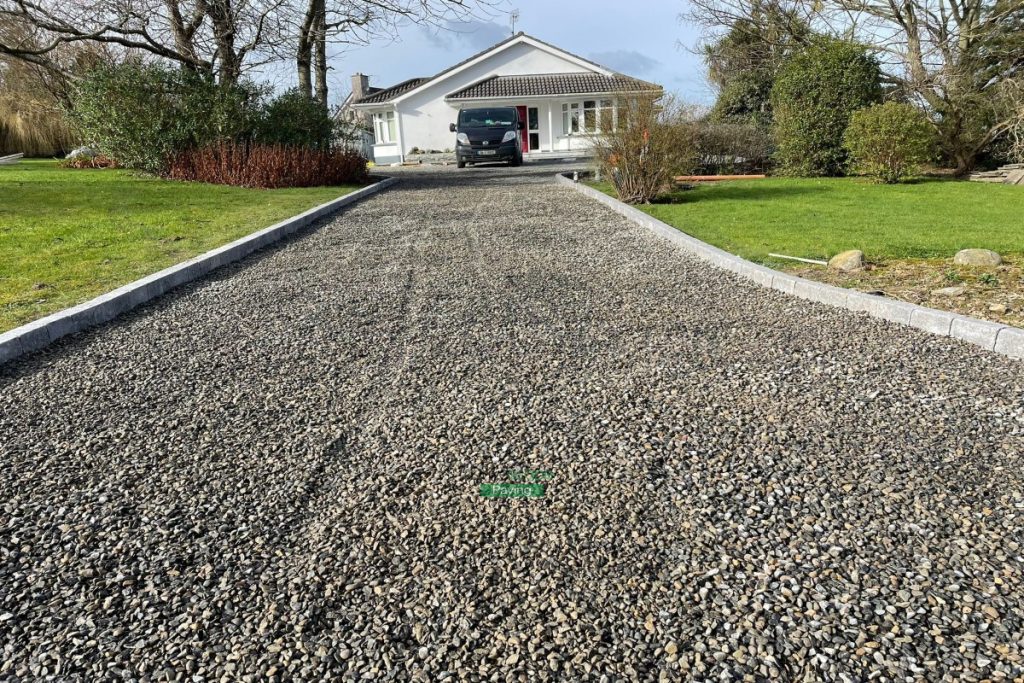 Gravelled Driveway with Asphalt Apron and Cladded Flower Beds in Skerries, Co. Dublin