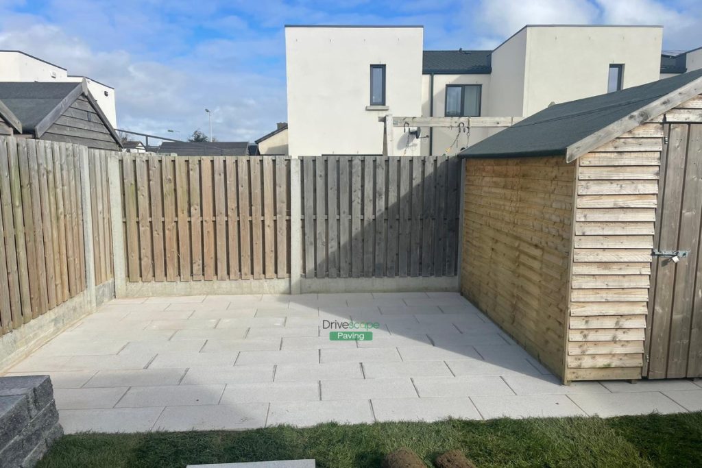 Patio with Silver Granite Slabs, Roll-On Turf and Granite Walling in Ballymun, Dublin