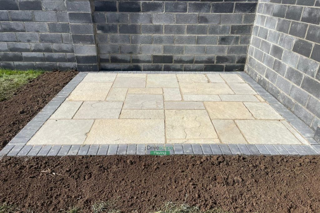 Patio with Tumbled Limestone Slabs and Brick Border in Dunshaughlin, Co. Meath (2)
