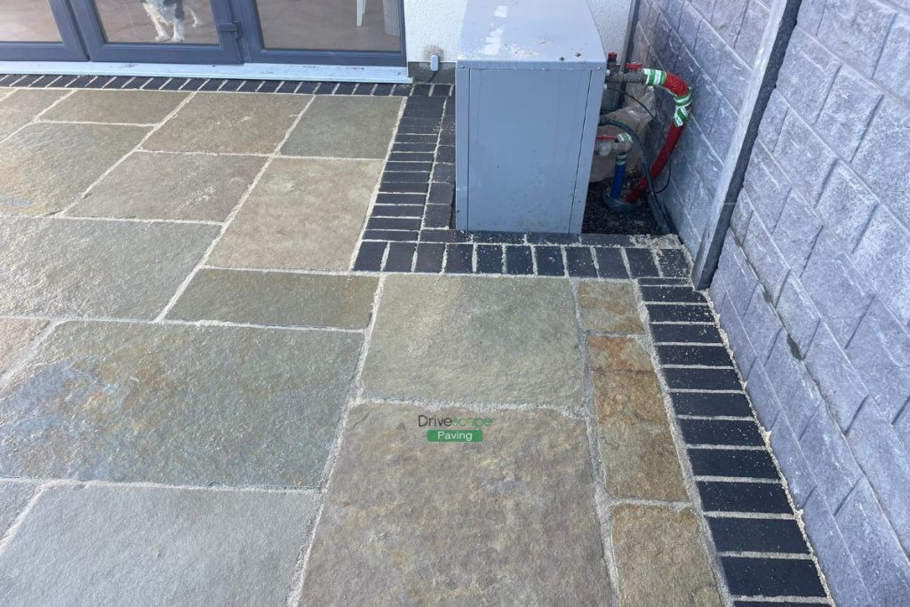 Patio with Tumbled Limestone Slabs and Brick Border in Dunshaughlin, Co. Meath (6)