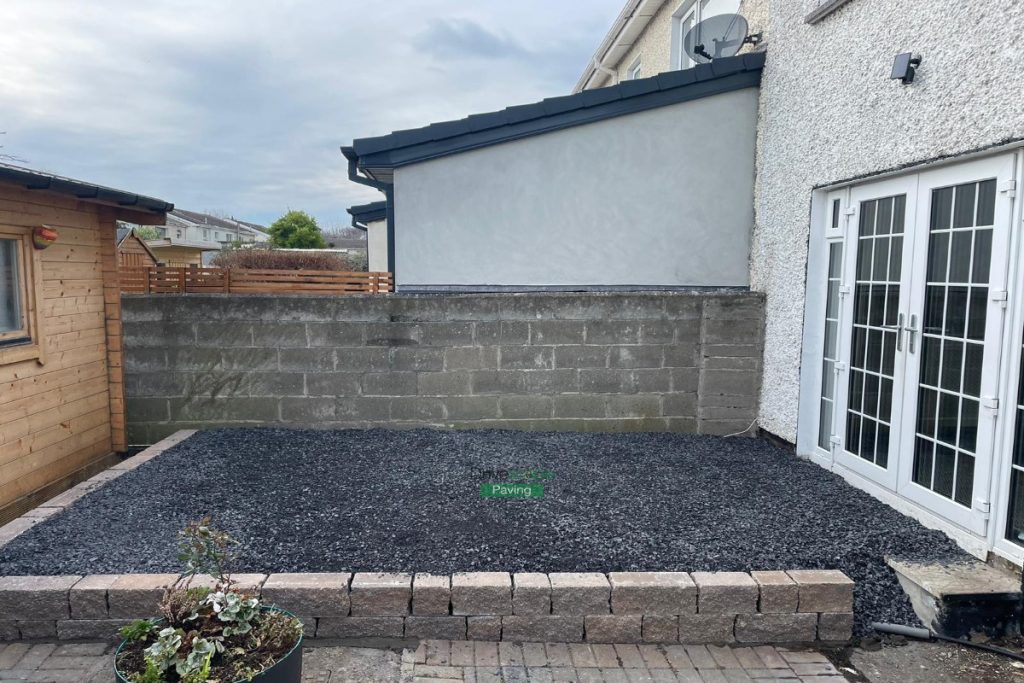 Raised Granite Slabbed Patio with Connemara Walling in Coolock, Dublin (3)