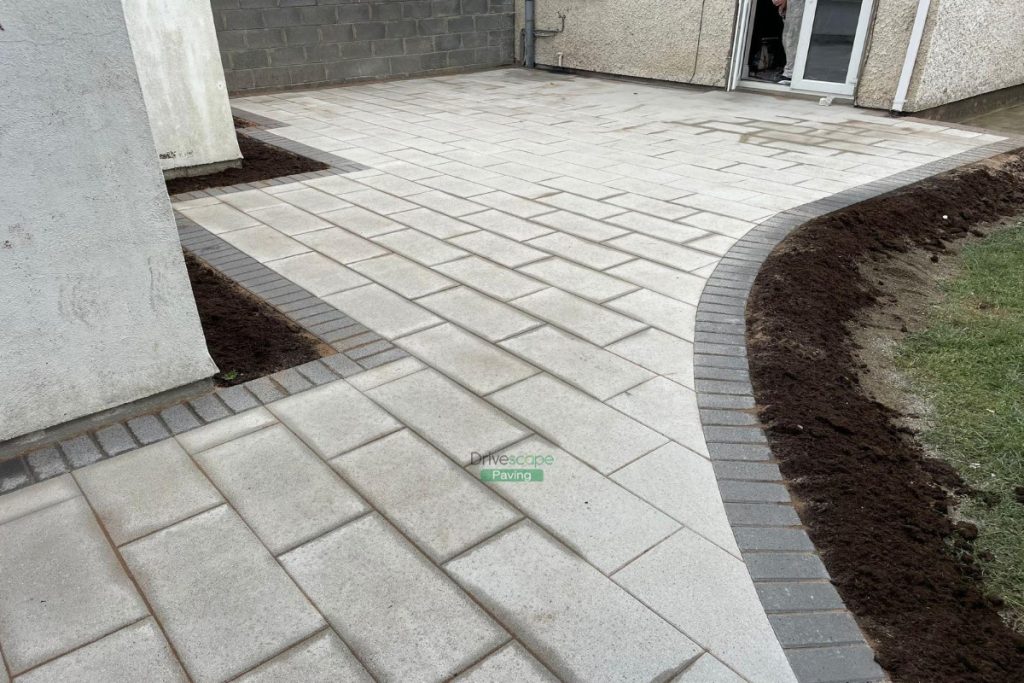 Granite Slabbed Patio with Curved Flowerbeds in Lucan, Dublin
