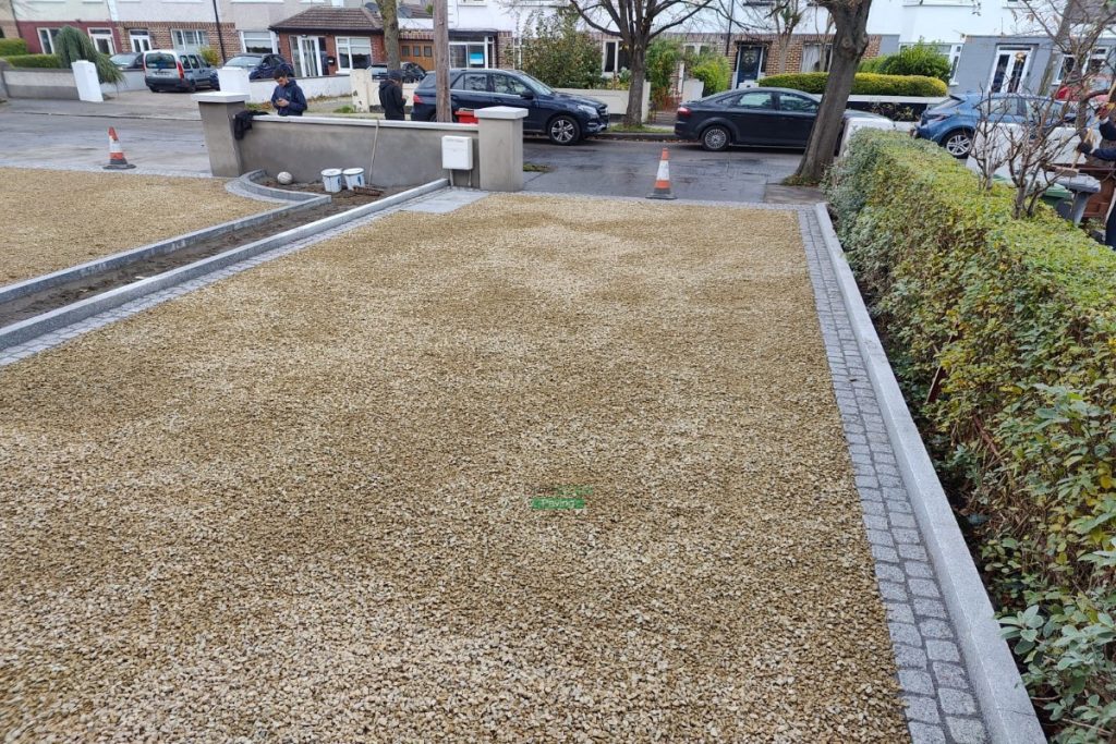 Two Adjacent Driveways with Golden Gravel and Silver Granite Cobblestones in Clontarf, Dublin (3)
