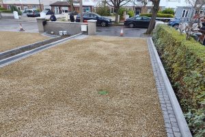 Two Adjacent Driveways with Golden Gravel and Silver Granite Cobblestones in Clontarf, Dublin (3)