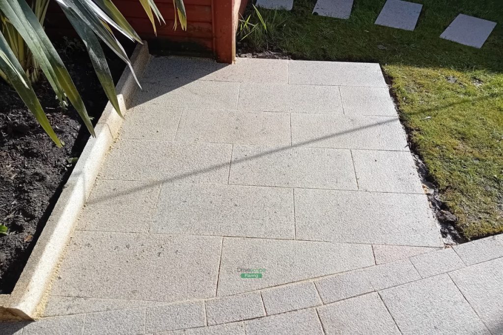 Patio with Brown Granite Slabs, Bull-Nose Step and Stepping Stones in Clontarf, Dublin (10)