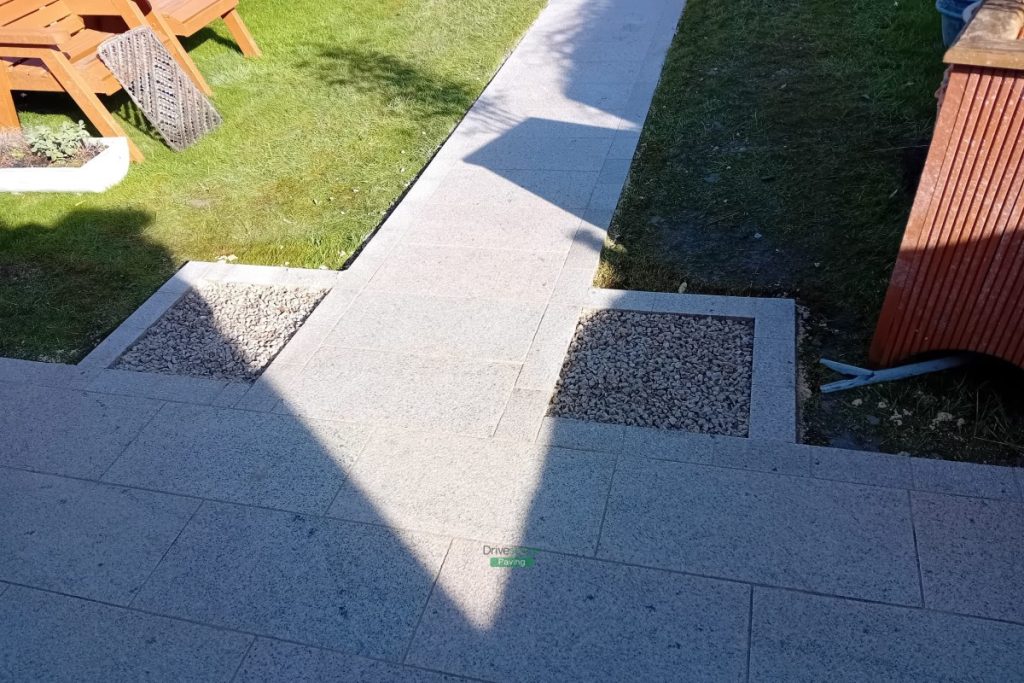 Patio with Brown Granite Slabs, Bull-Nose Step and Stepping Stones in Clontarf, Dublin