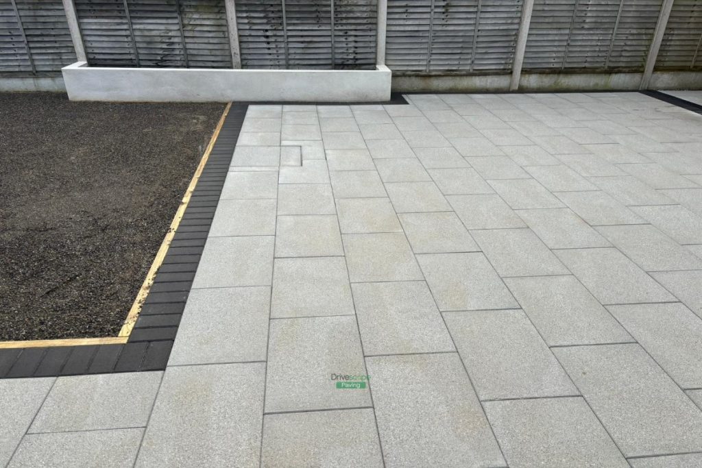 Silver Granite Slabbed Patio with Boxed Flowerbeds in Hansfield Wood, Dublin (8)