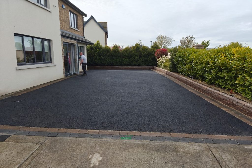 Asphalt Driveway with Connemara Walling and Charcoal and Curragh Gold Borderline in Swords, Dublin