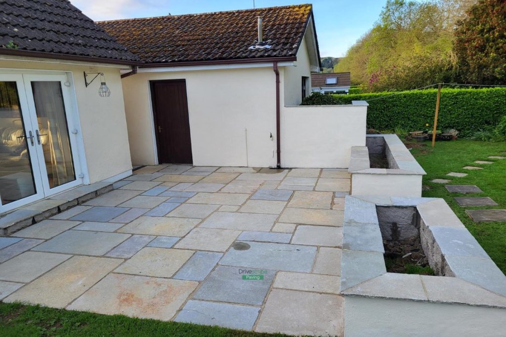 Limestone Paved Patio with Flowerbeds and New Oil Tank Wall in Ashford, Co. Wicklow (1)