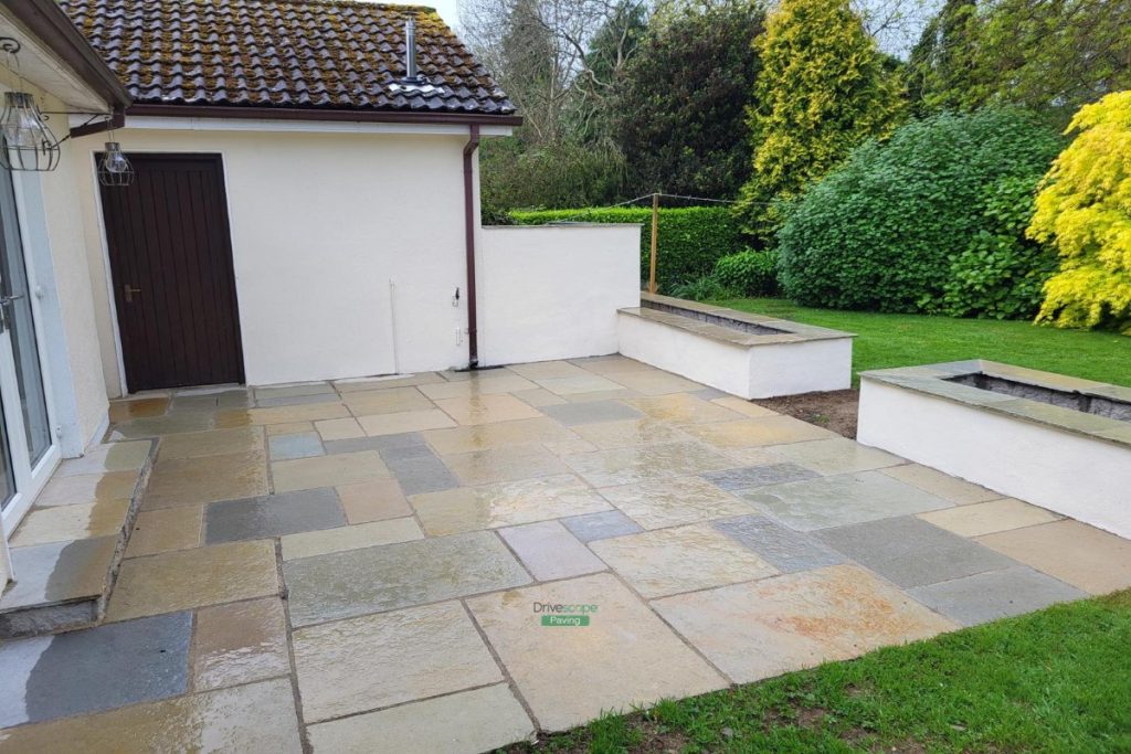 Limestone Paved Patio with Flowerbeds and New Oil Tank Wall in Ashford, Co. Wicklow