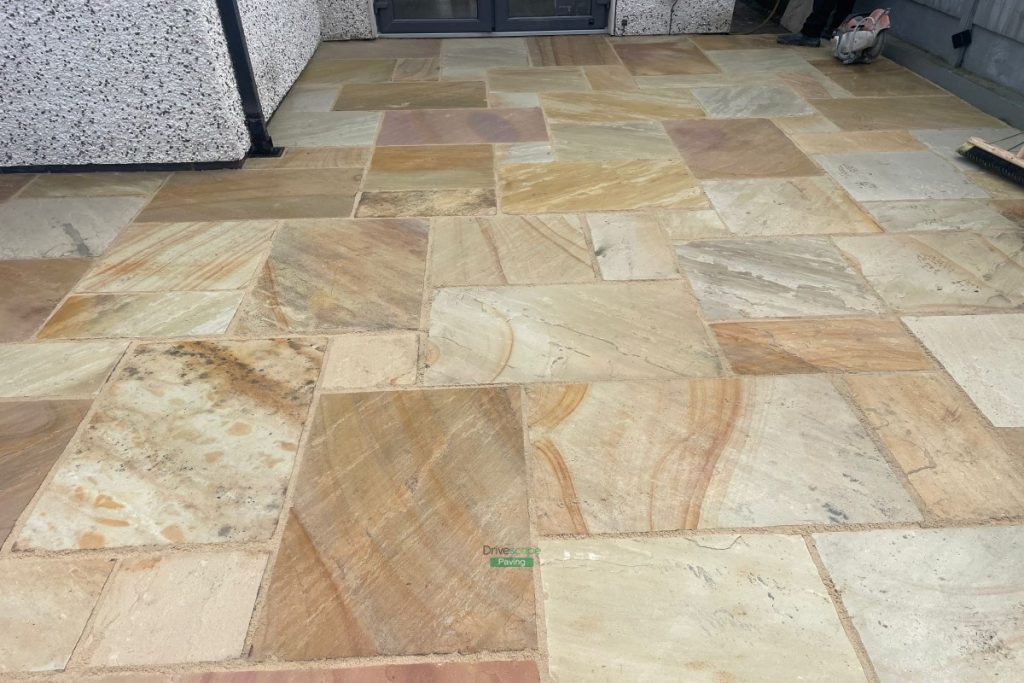 Mint Sandstone Slabbed Patio with Sleepers and ACO Channels in Delgany, Co. Wicklow (10)