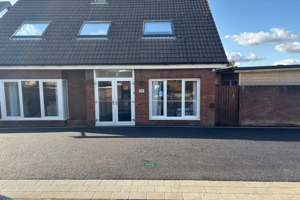 Asphalt Driveway with Silver Granite Border and Flowerbeds in Sutton, Dublin
