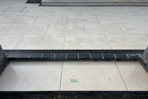 Patio with Porcelain Tiles and Limestone Cobbles in Clontarf, Dublin (12)