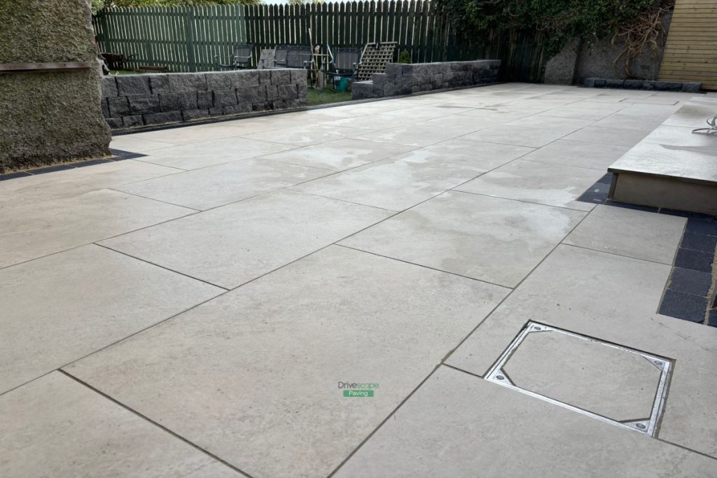 Patio with Porcelain Tiles and Limestone Cobbles in Clontarf, Dublin