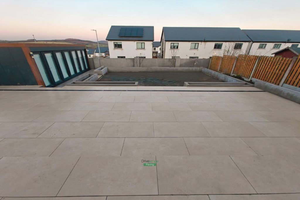 Porcelain Tiled Patio with Artificial Grass and Classic Slabs in Wicklow