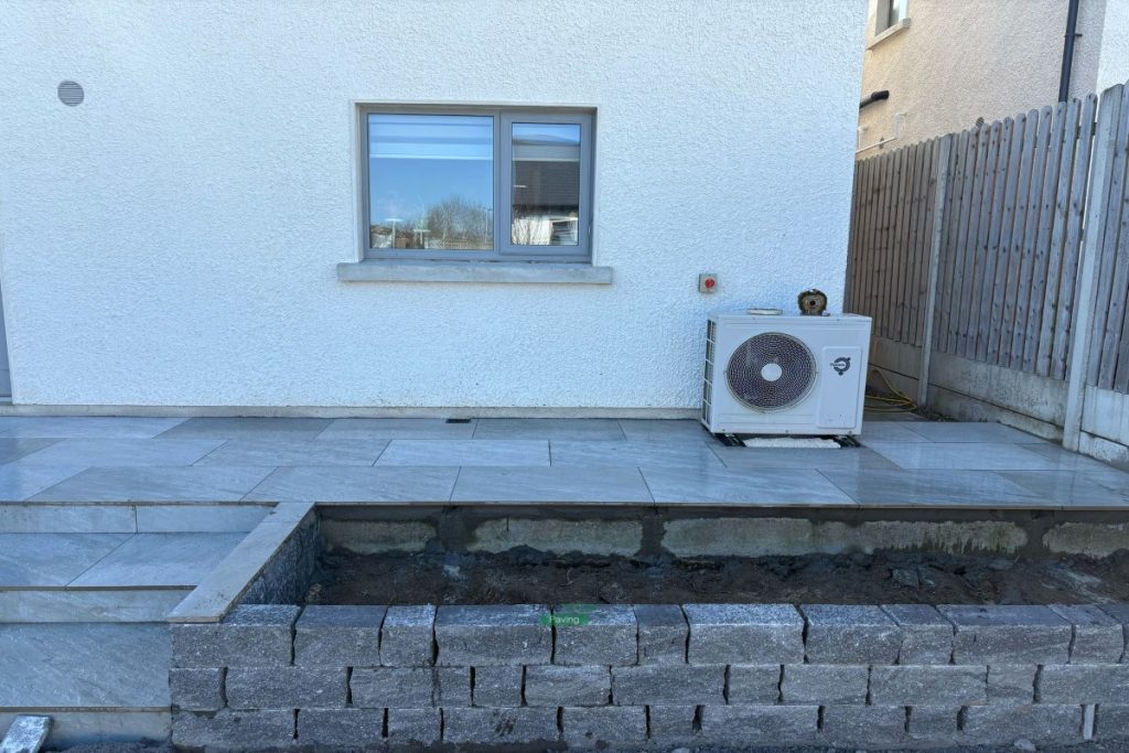 Porcelain Tiled Patio with Connemara Walling in Wicklow